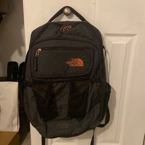 Gray and Rose Gold North Face Backpack